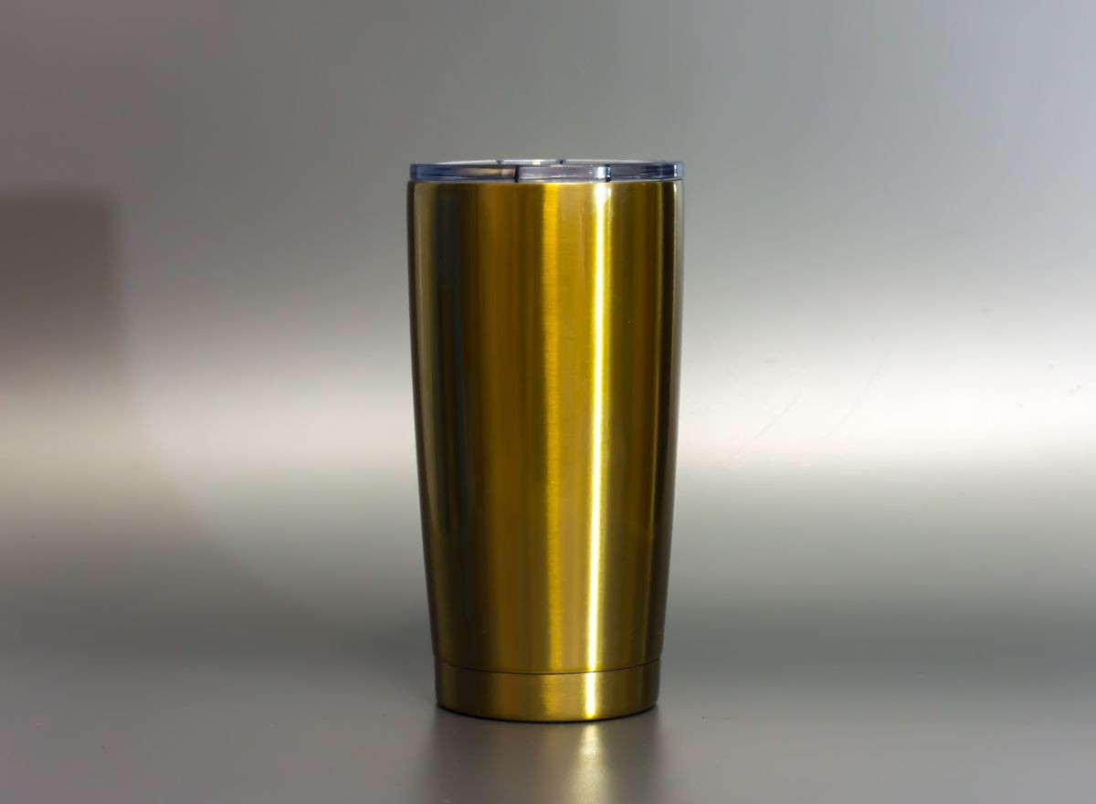 
Cup cold storage.
Tumbler glass cold store.
Stainless steel thermos tumbler mug on gray background. 